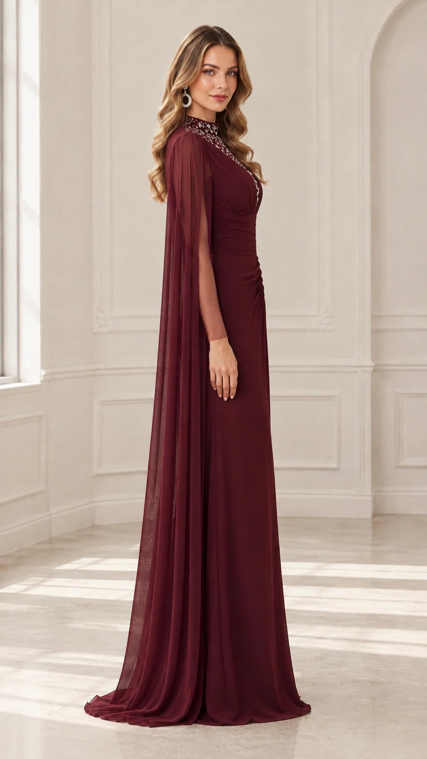Side angle view of burgundy cape sleeve formal gown showing flowing silhouette