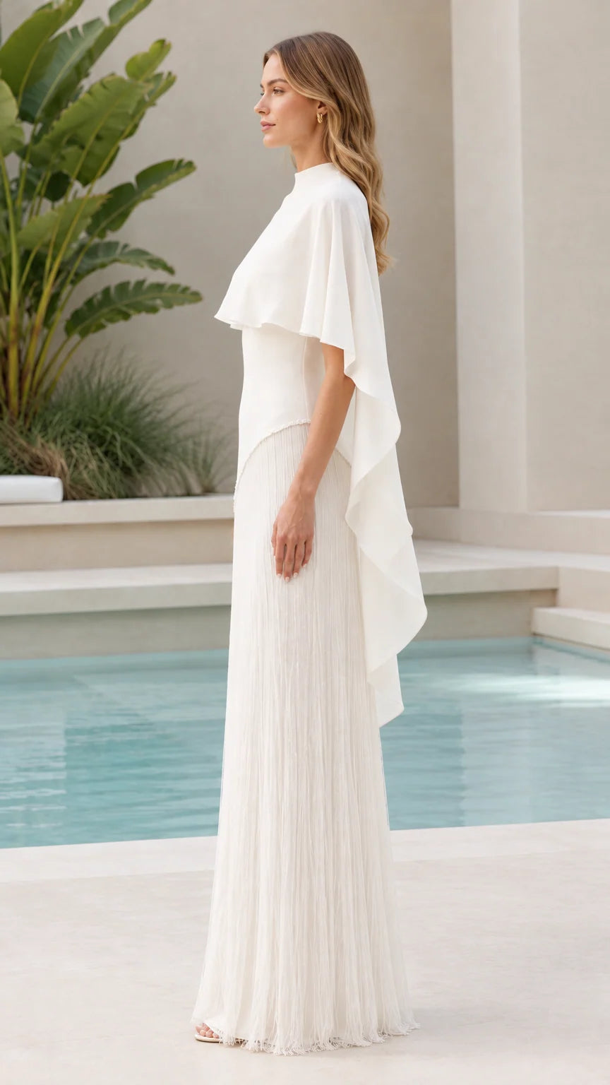 White cape overlay pleated formal evening gown side view