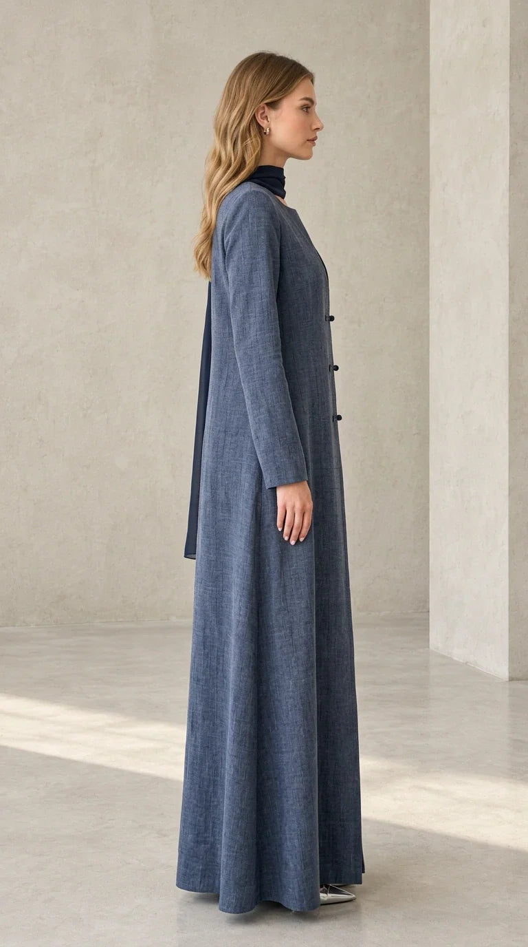 Side profile of woman wearing Slate Blue tailored long sleeve maxi dress