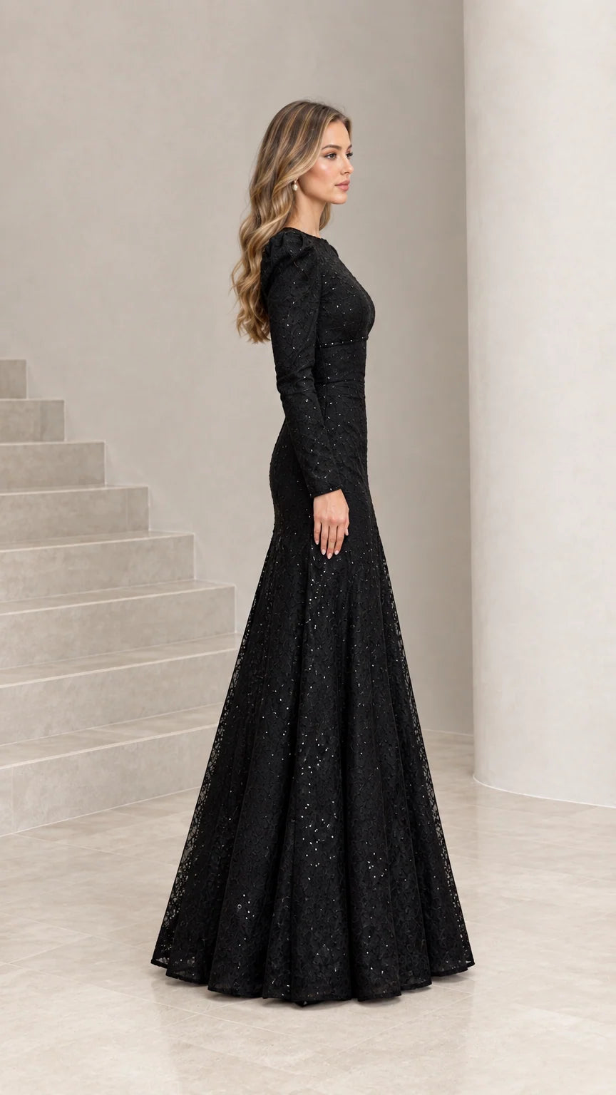 Side profile of black long sleeve sequin lace evening dress showing trumpet silhouette