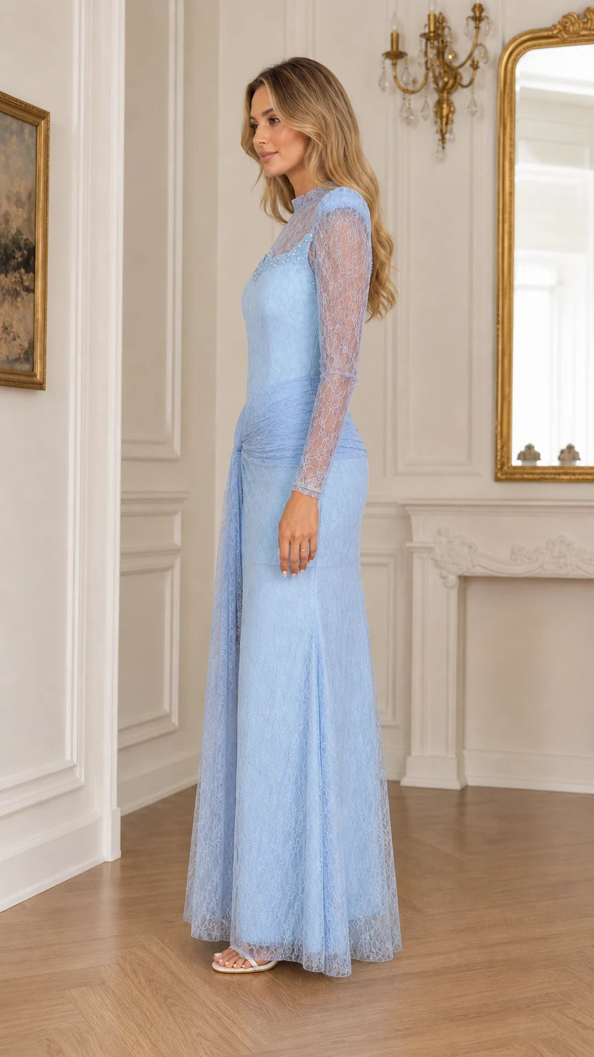 Side profile view of a woman in a floor-length light blue lace formal dress
