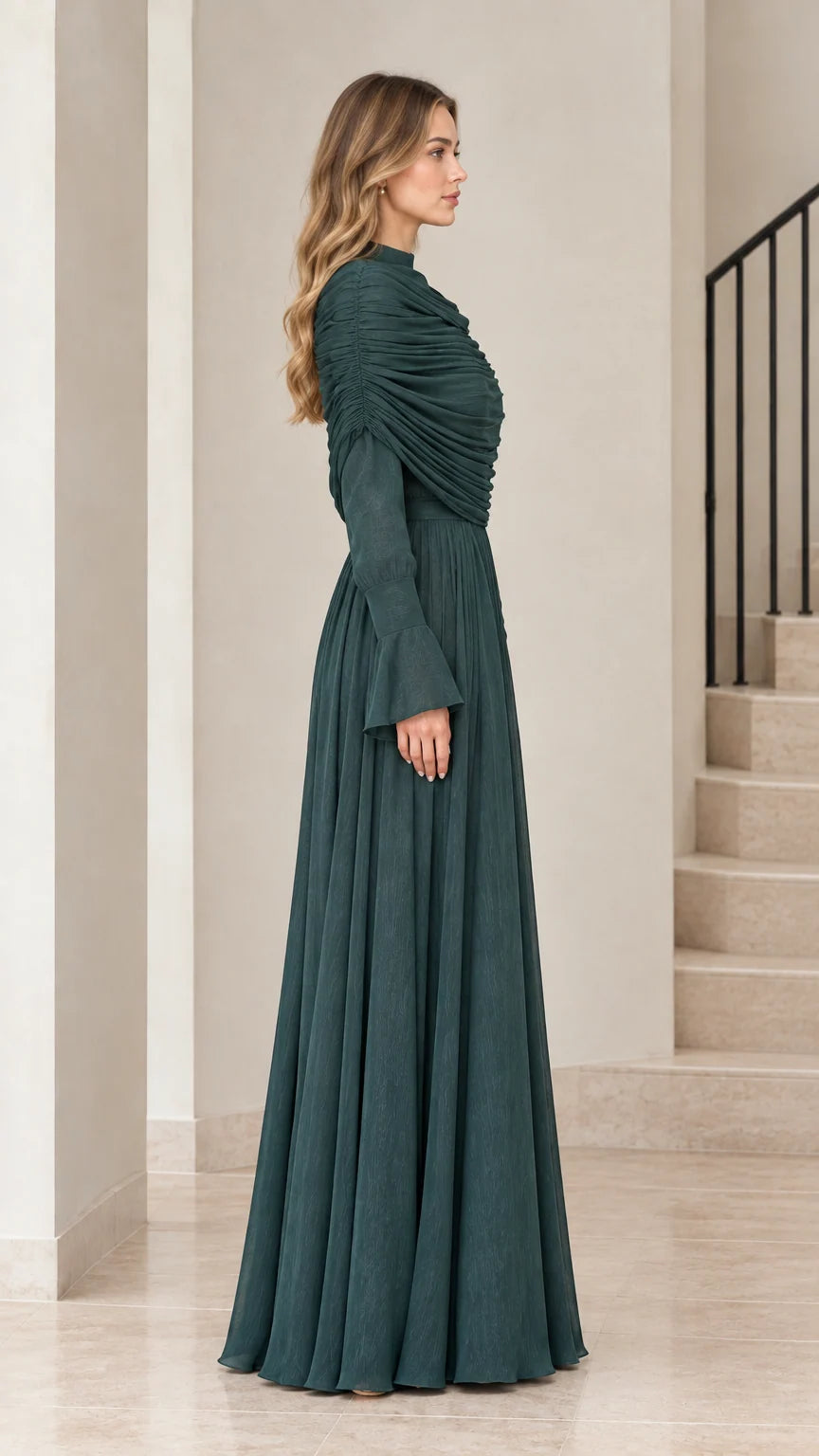 Side profile of Emerald Green long sleeve pleated evening gown