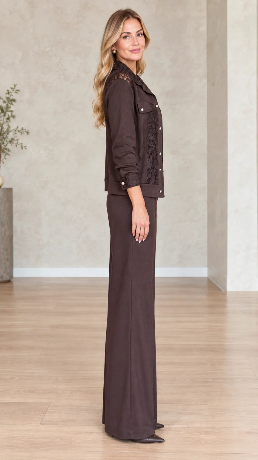 Side profile view of dark brown two-piece jacket and wide-leg pants set