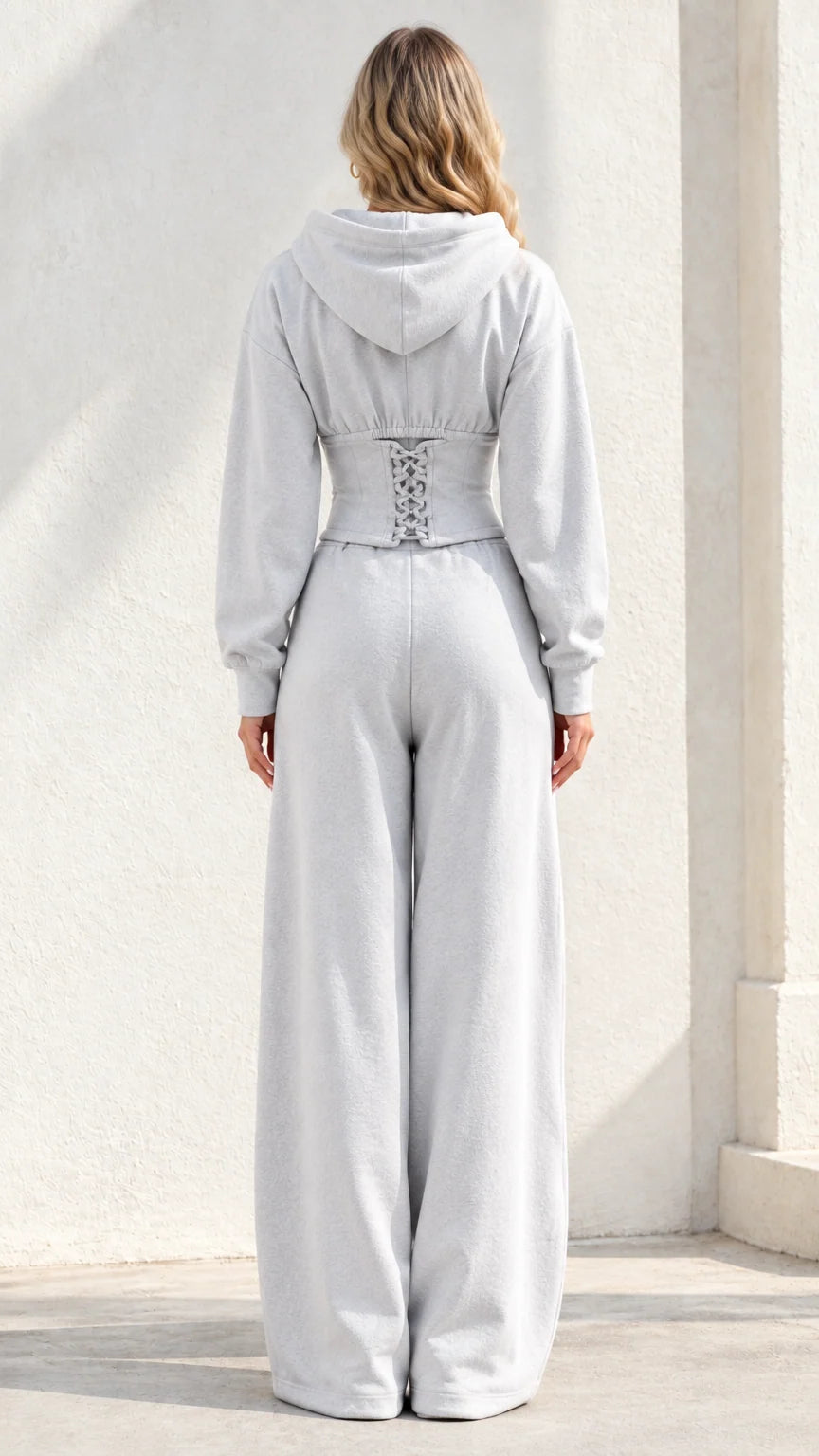 Back view of Light Grey corset hoodie showing lace-up back waist detail
