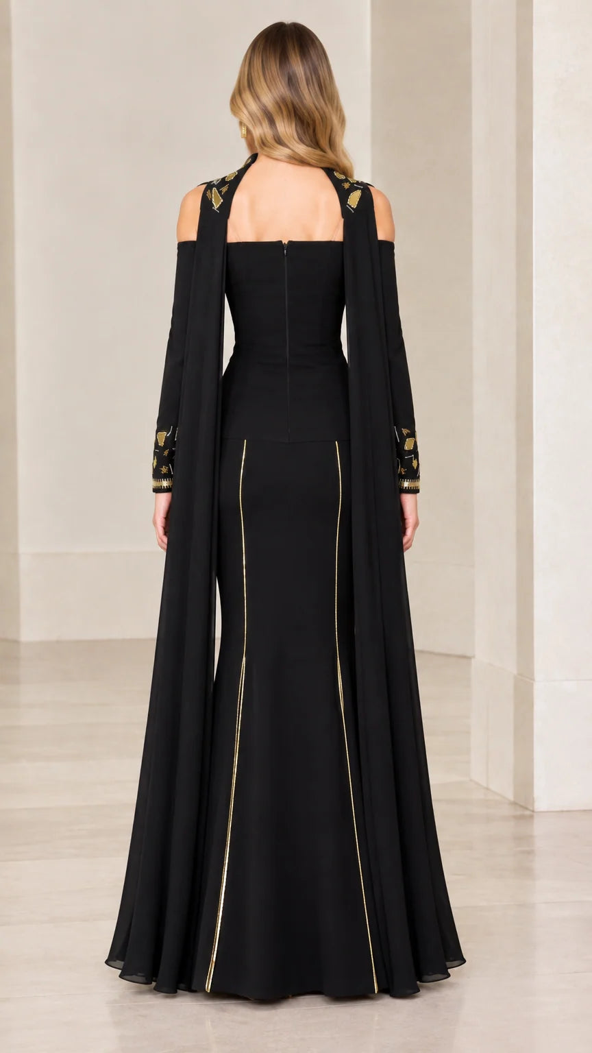 Back view of black floor-length formal gown with back zipper closure
