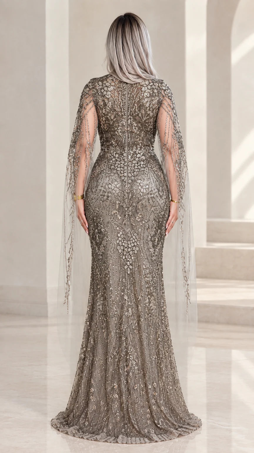 Back view of fitted grey embellished formal gown with back zipper