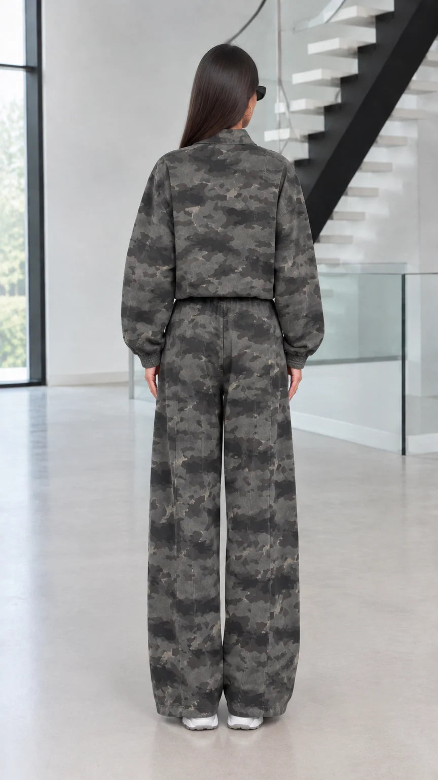 Back view of model wearing Green Camo cropped jacket and wide-leg trousers
