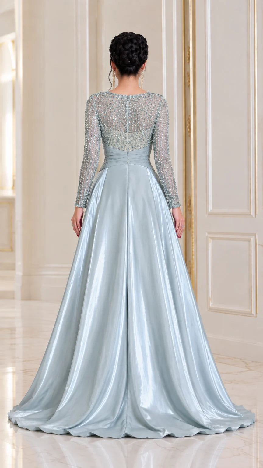 Back view of ice blue evening gown showing long sleeves and satin train