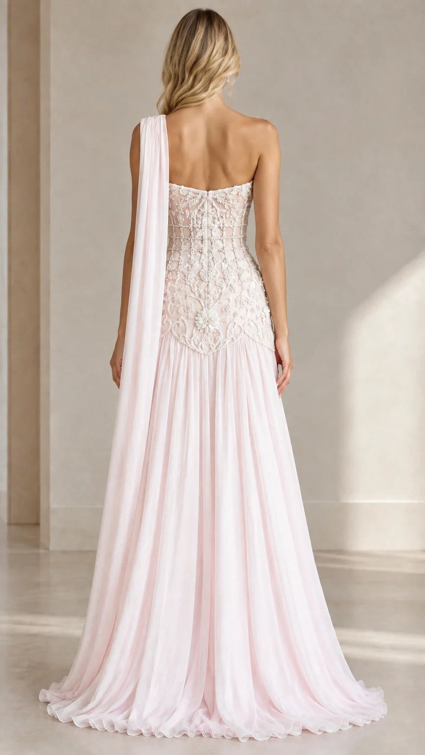 Back view of Blush Pink one-shoulder evening dress with shoulder sash