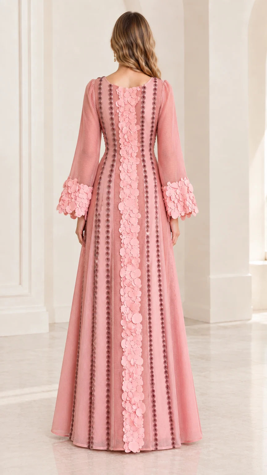 Back full-length view of dusty pink gown with linear bead trim details