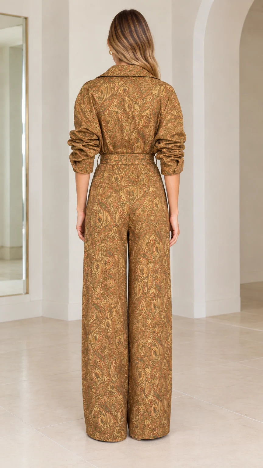Back view of woman wearing full-length camel paisley print jumpsuit