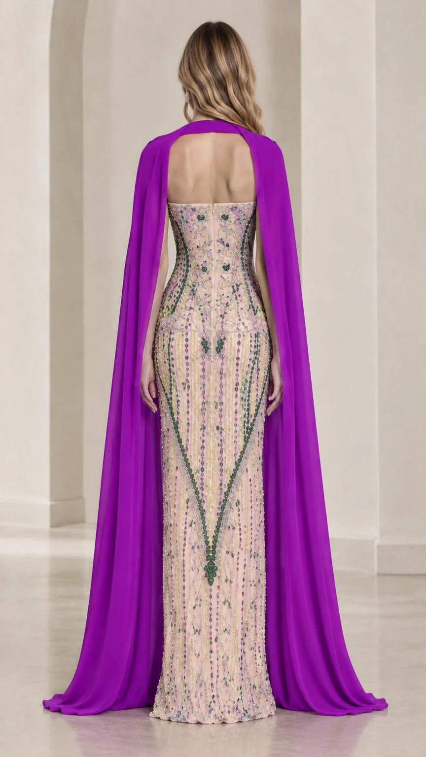 Rear view displaying flowing purple chiffon cape over beaded strapless floor-length gown