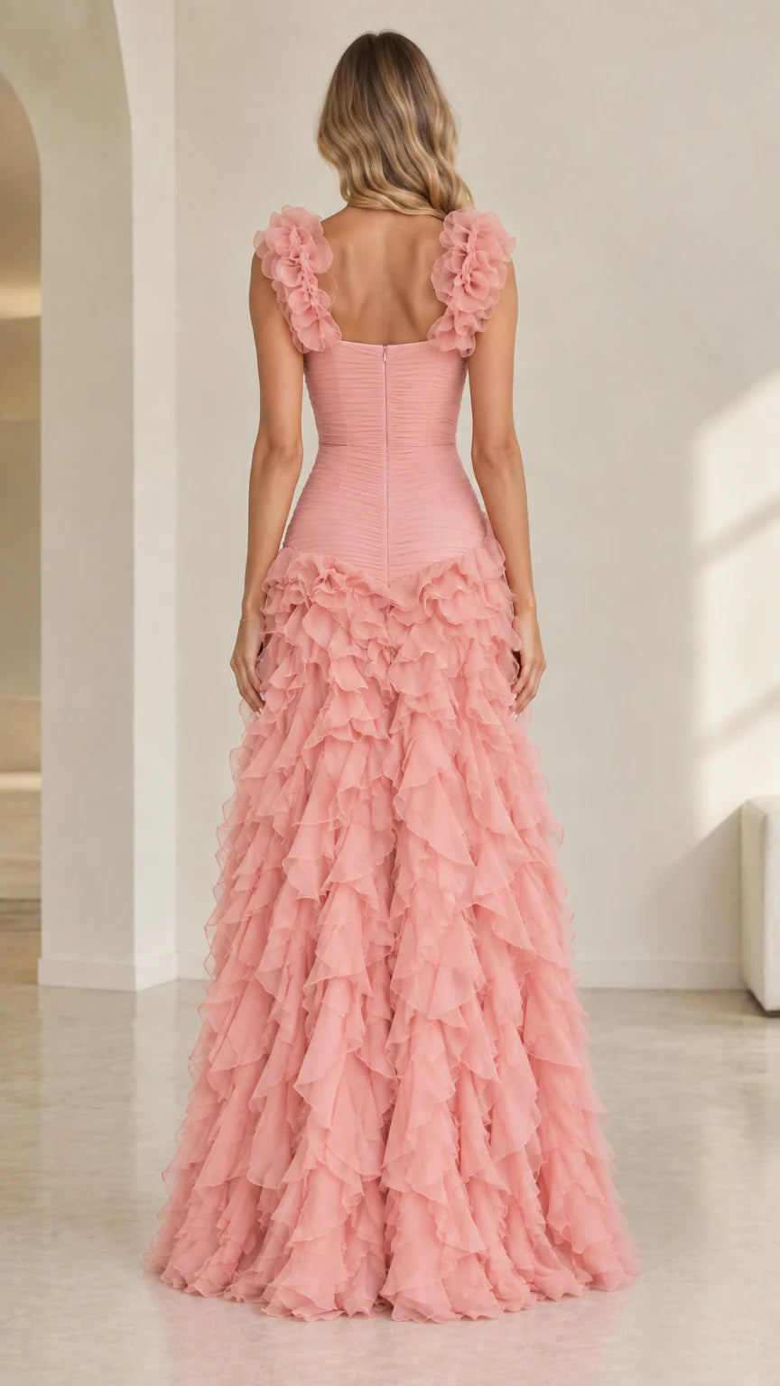 Back view of dusty pink evening gown showing fitted ruched back and zipper