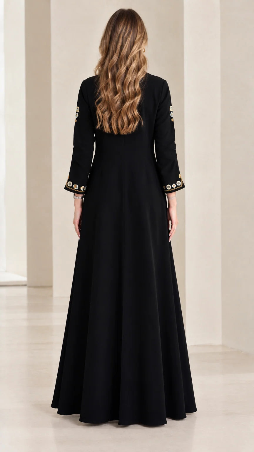 Back view of black long sleeve A-line maxi dress
