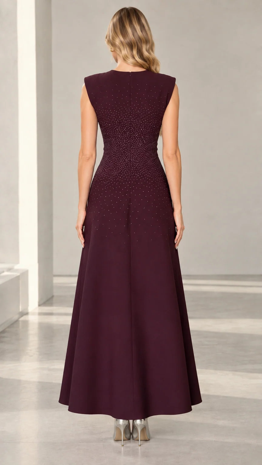 Burgundy formal evening gown back view showing tailored fit