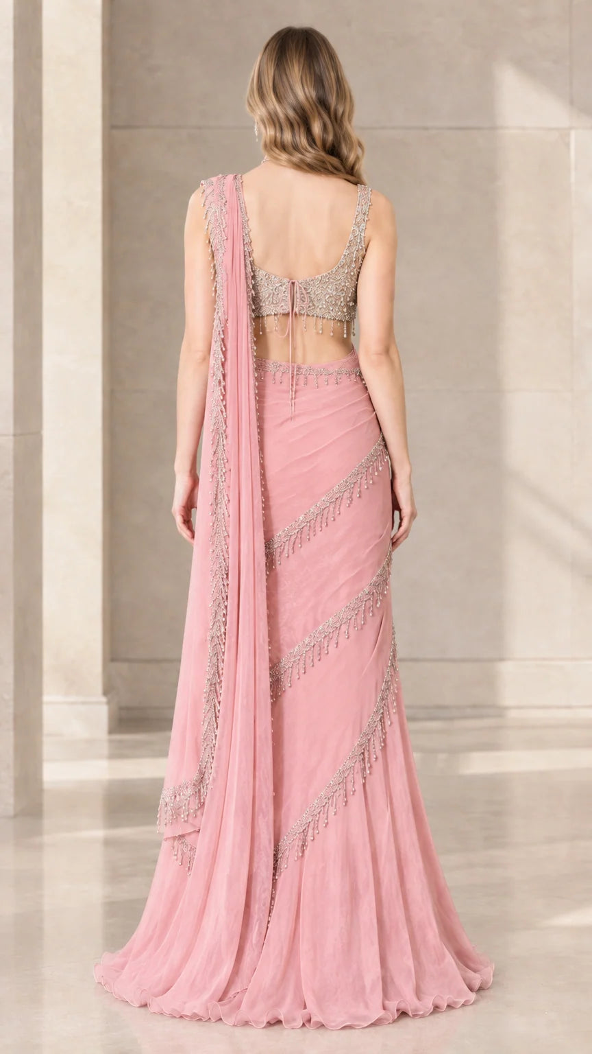 Back view of model wearing Blush Pink ready-to-wear saree with sequin crop top