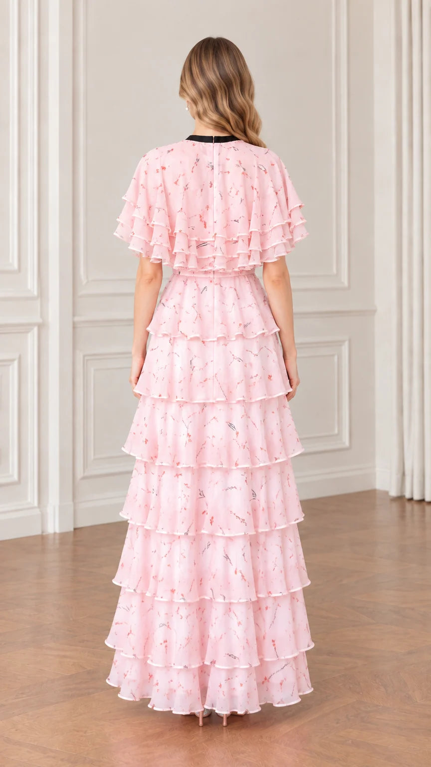 Back view of elegant pink floral tiered chiffon maxi dress