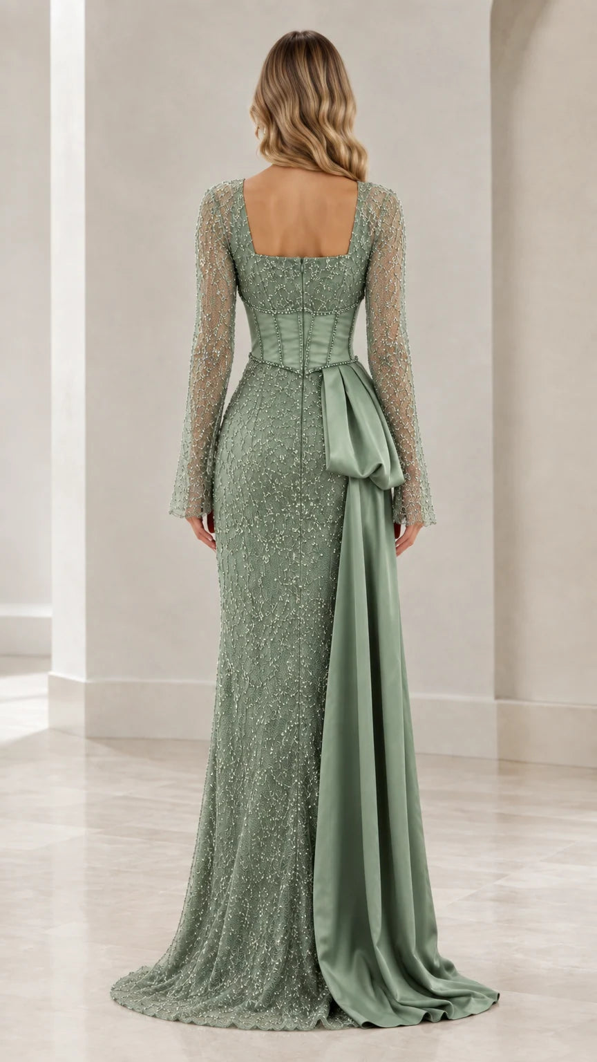 Back view of sage green square back beaded gown with tailored fit and side train