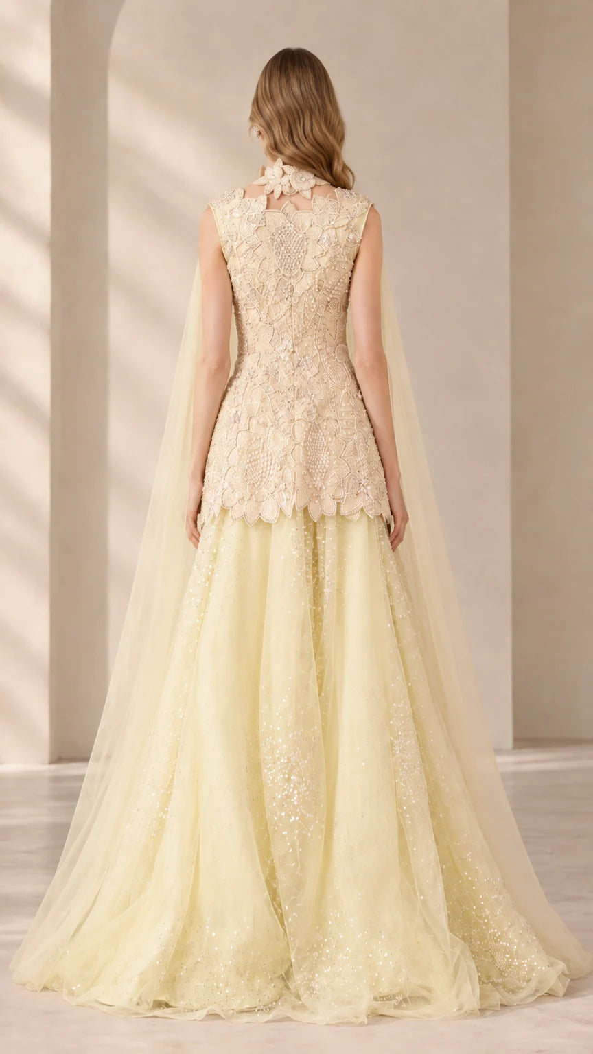 Back view of Champagne Yellow peplum gown showing sheer tulle cape drape