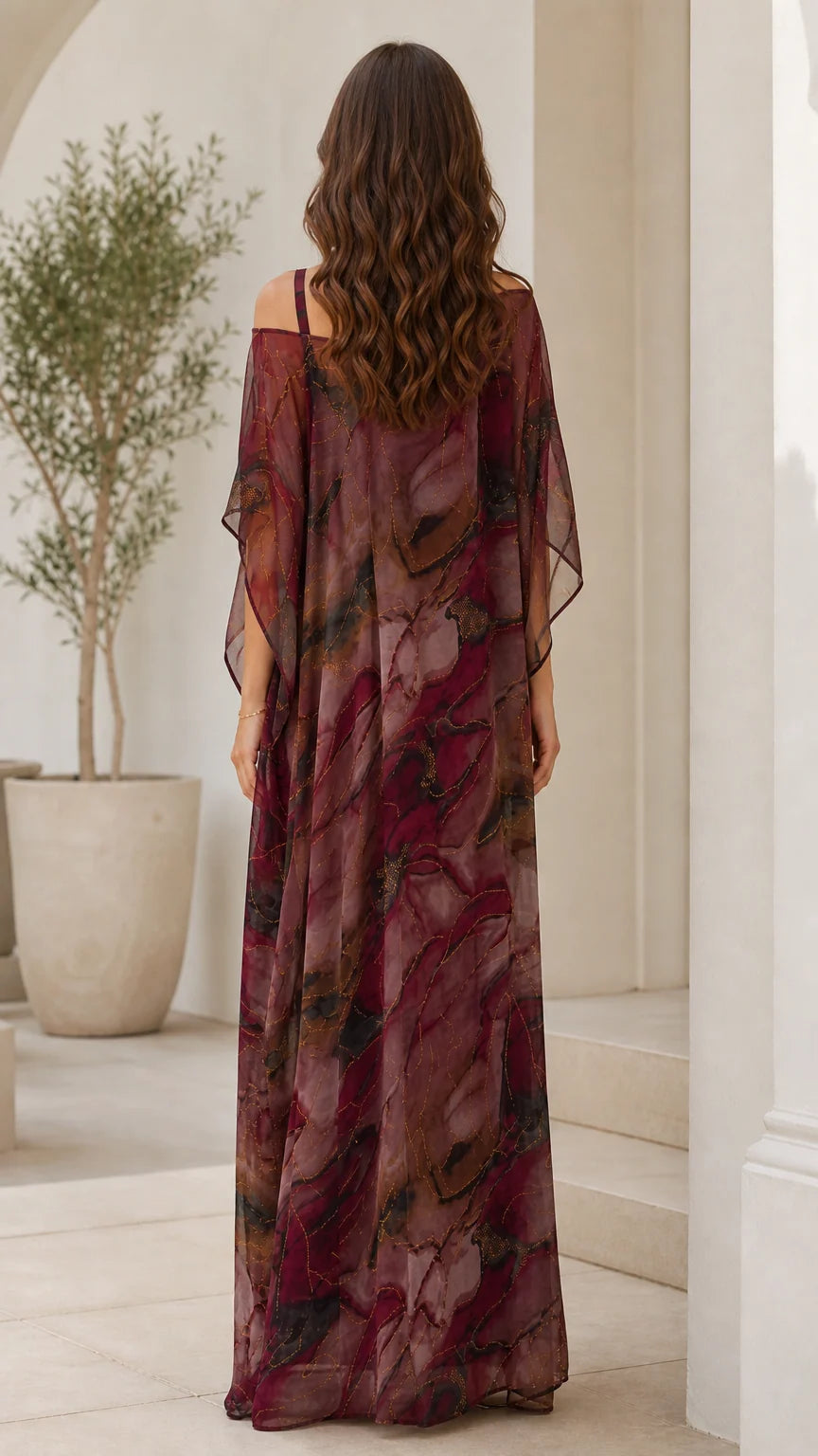 Back view of burgundy sheer overlay draped maxi dress