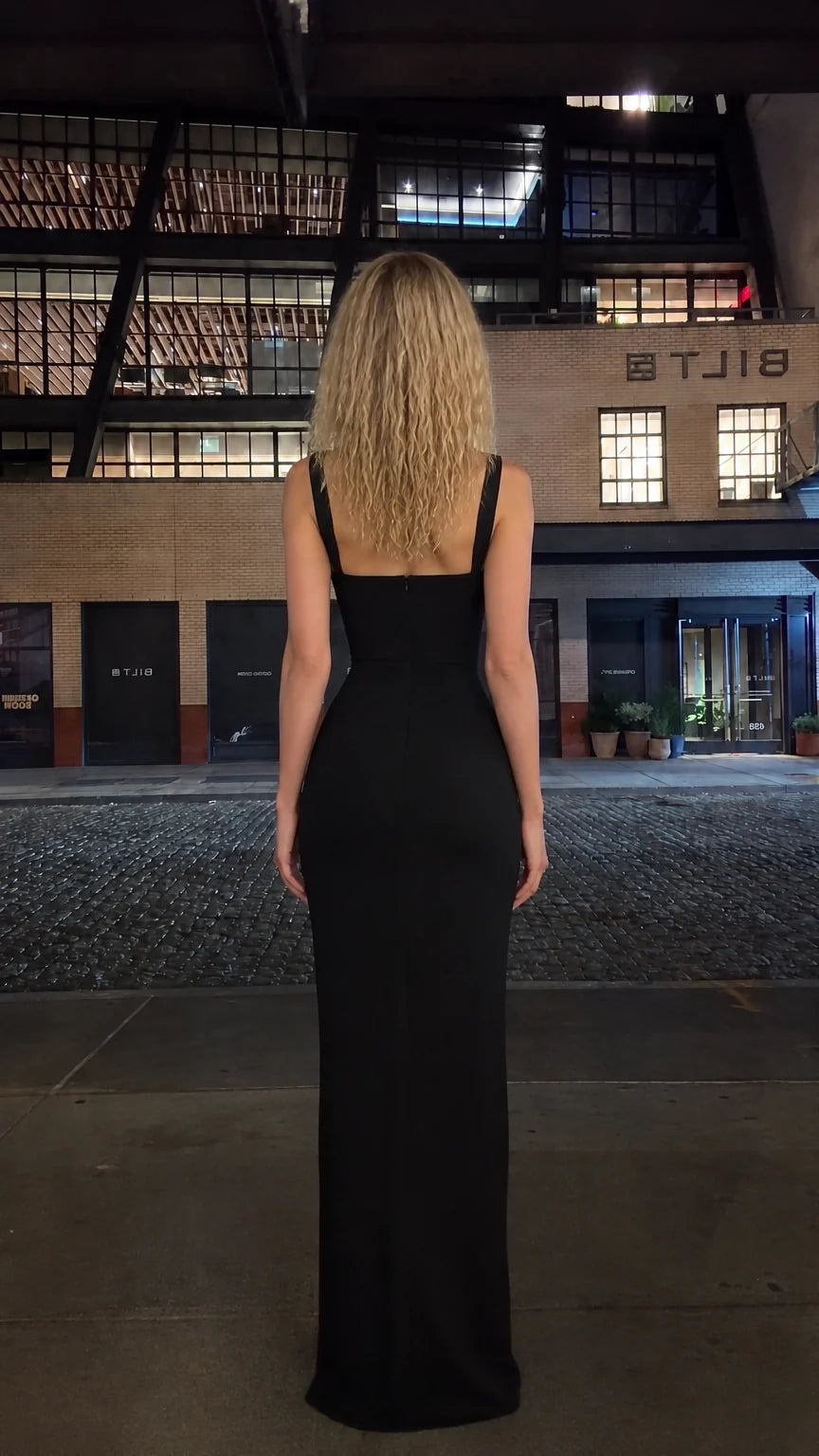 Back view of black sleeveless evening gown