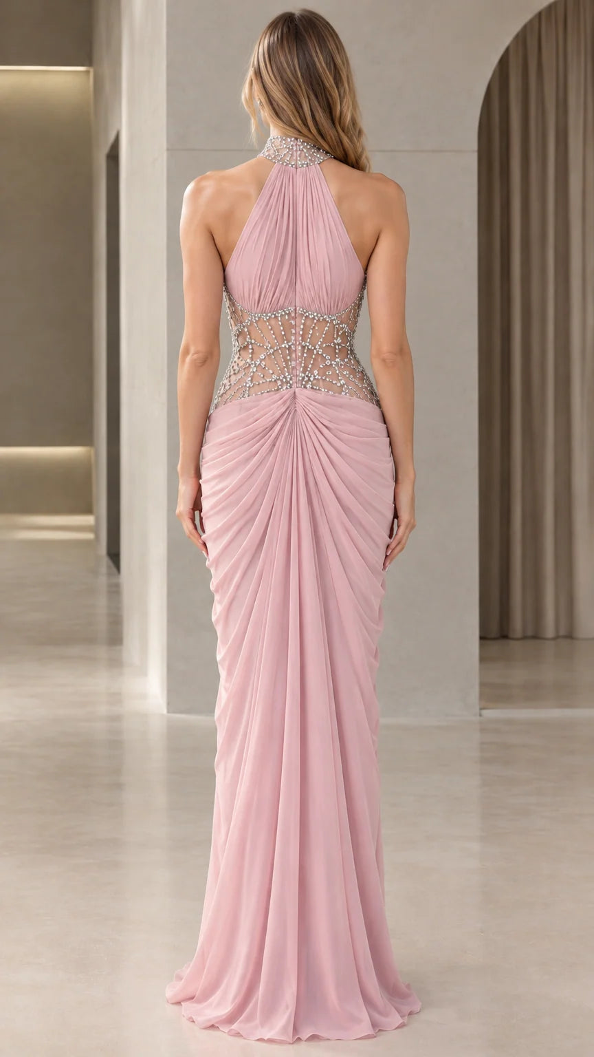 Back view of model in Blush Pink halter neck formal dress with open back design