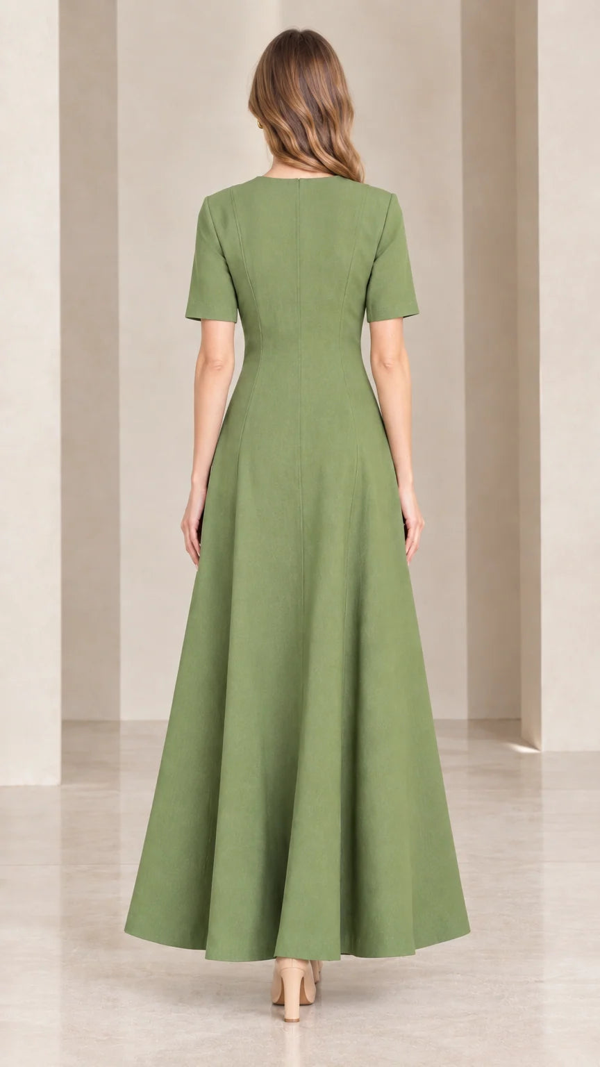 Back view of woman wearing sage green short sleeve maxi dress