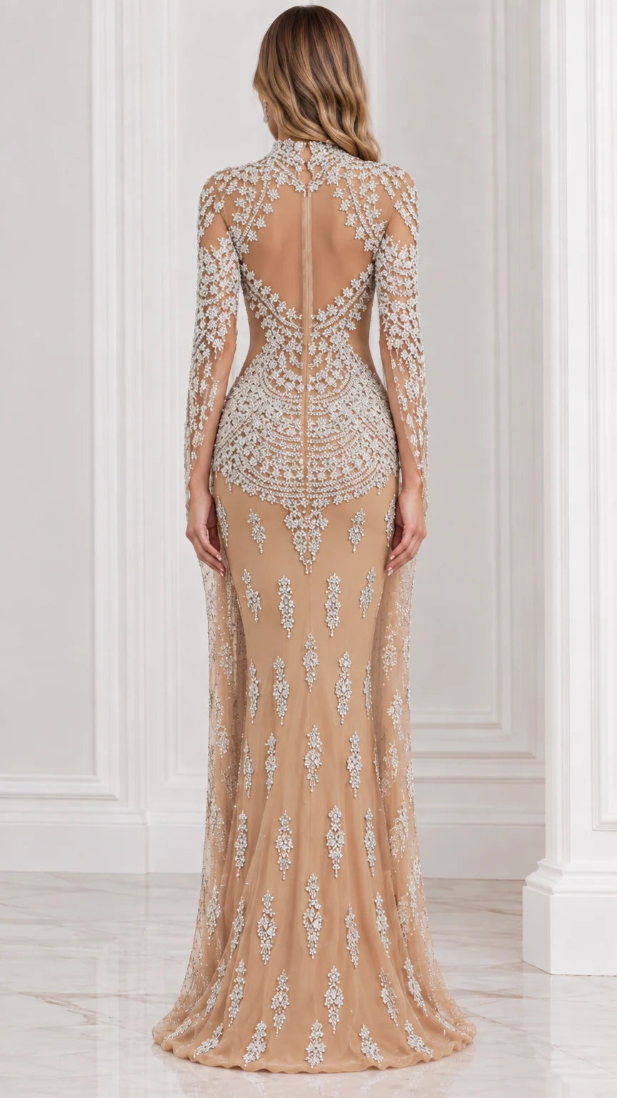 Back view of champagne illusion cutout beaded evening dress