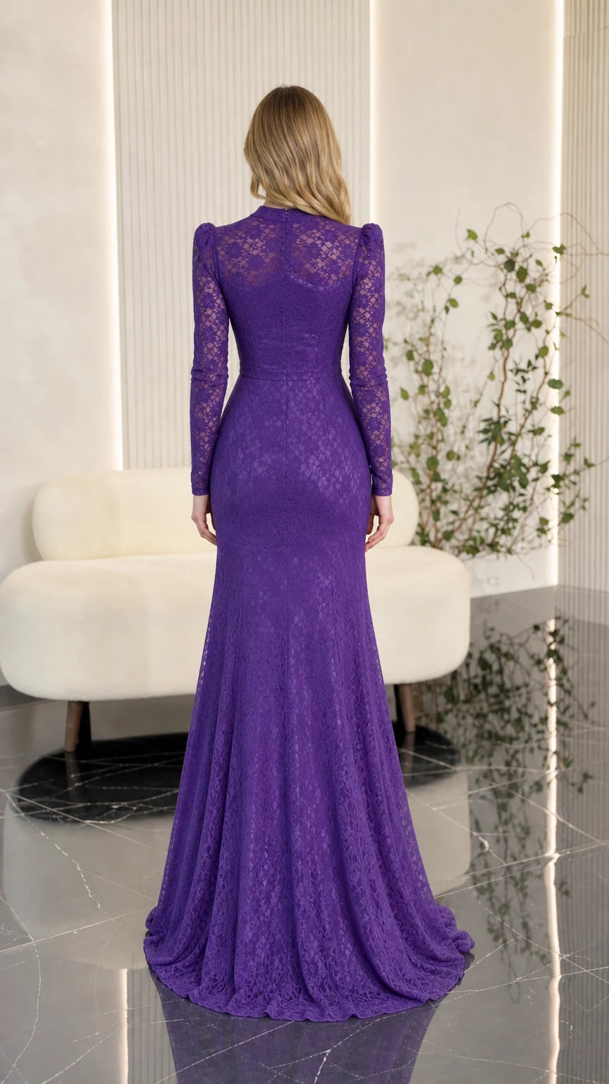 Back view of purple long sleeve lace evening gown showing fit and length