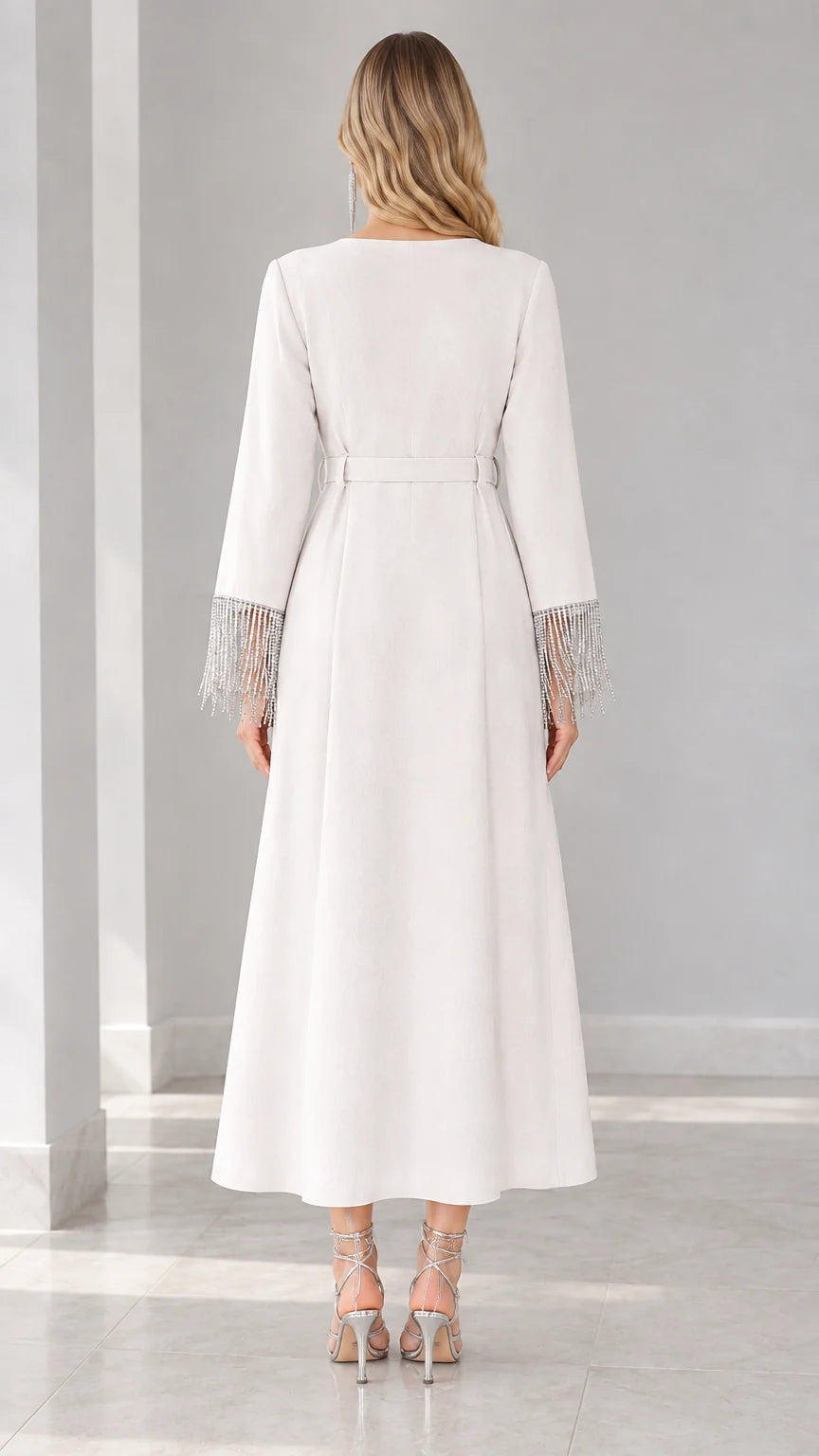 Back view of white long sleeve A-line maxi dress