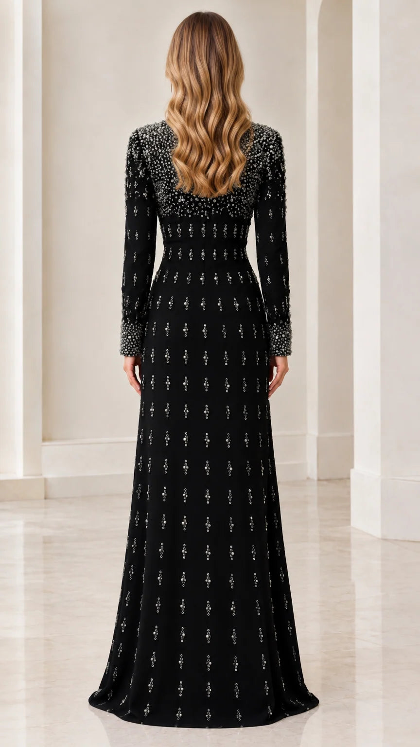 Back view of woman wearing Black long sleeve gown showing concealed zipper
