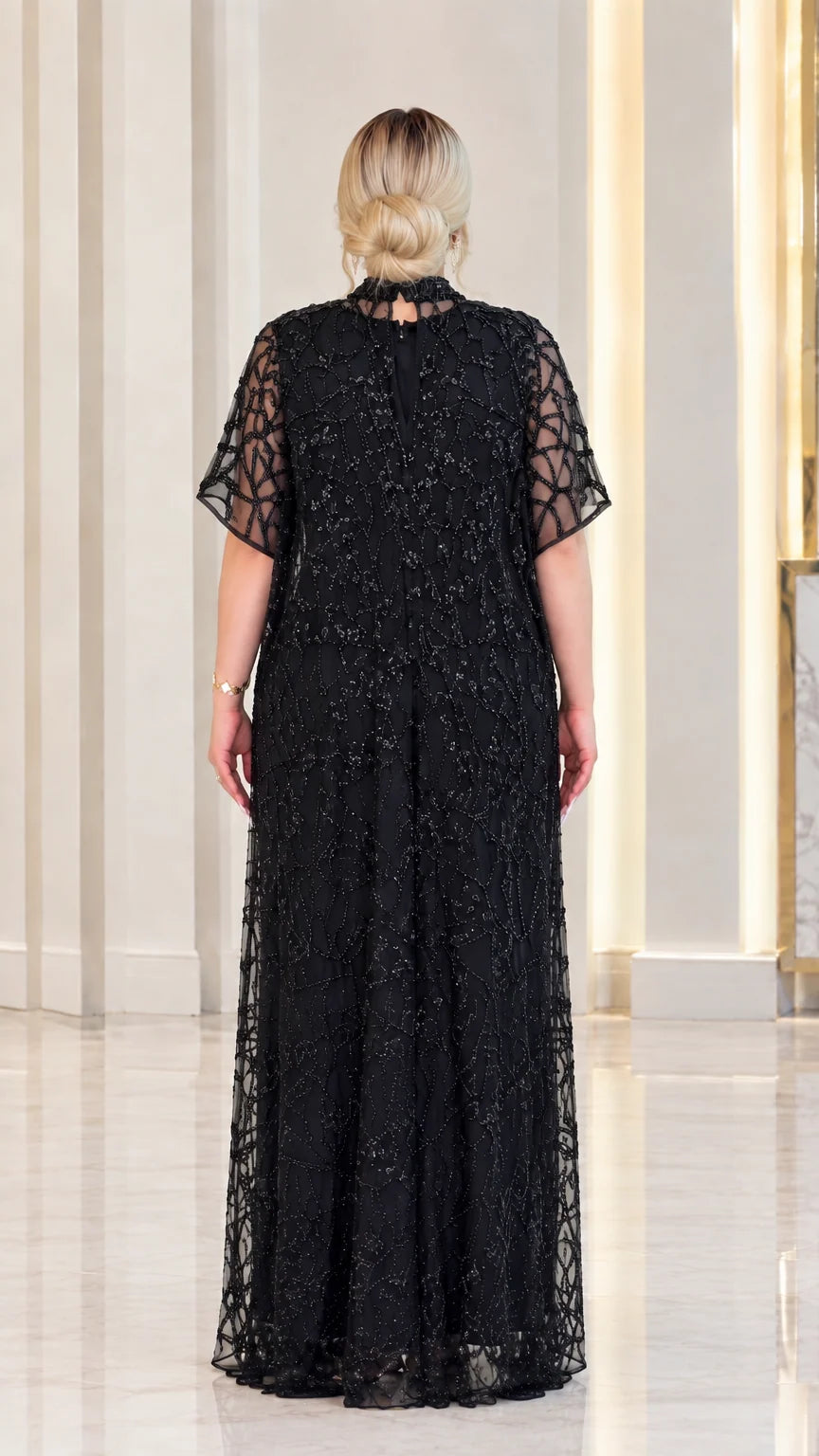 Back view of black high neck evening gown showing back closure