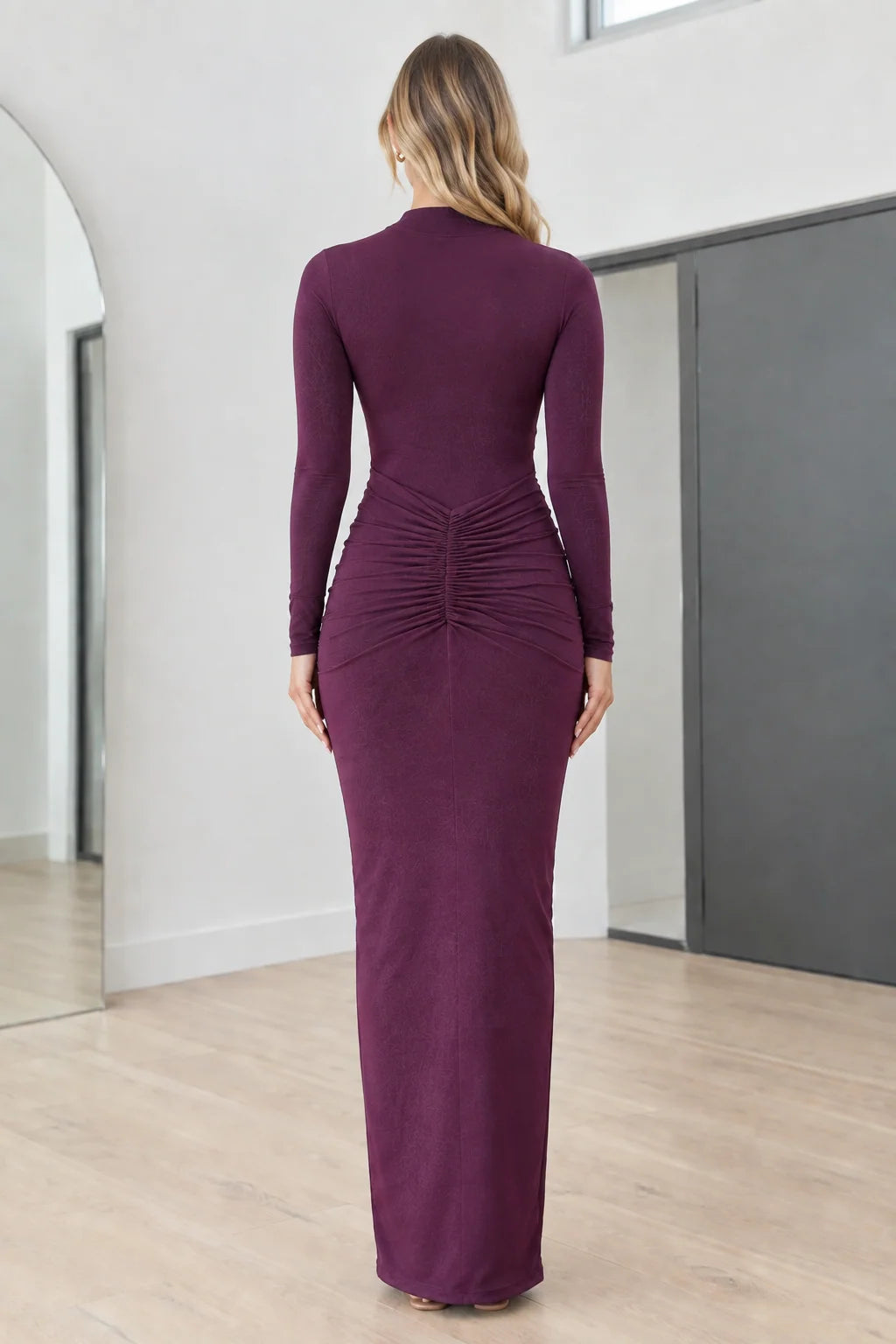 Back view showing ruched waist detail of Plum bodycon maxi dress