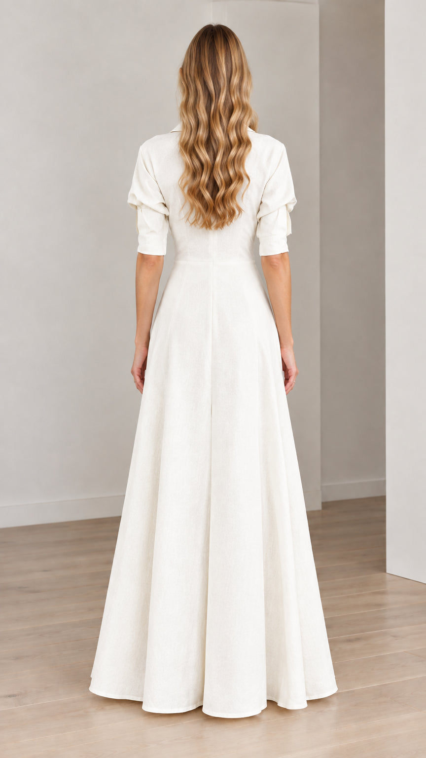 Back view of model wearing an Ivory White collared wide-leg maxi jumpsuit