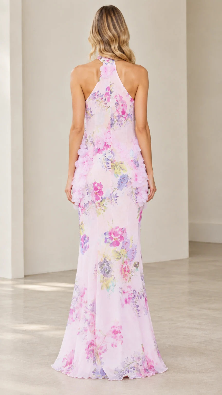 Back view of model wearing Blush Pink floral high-neck maxi dress