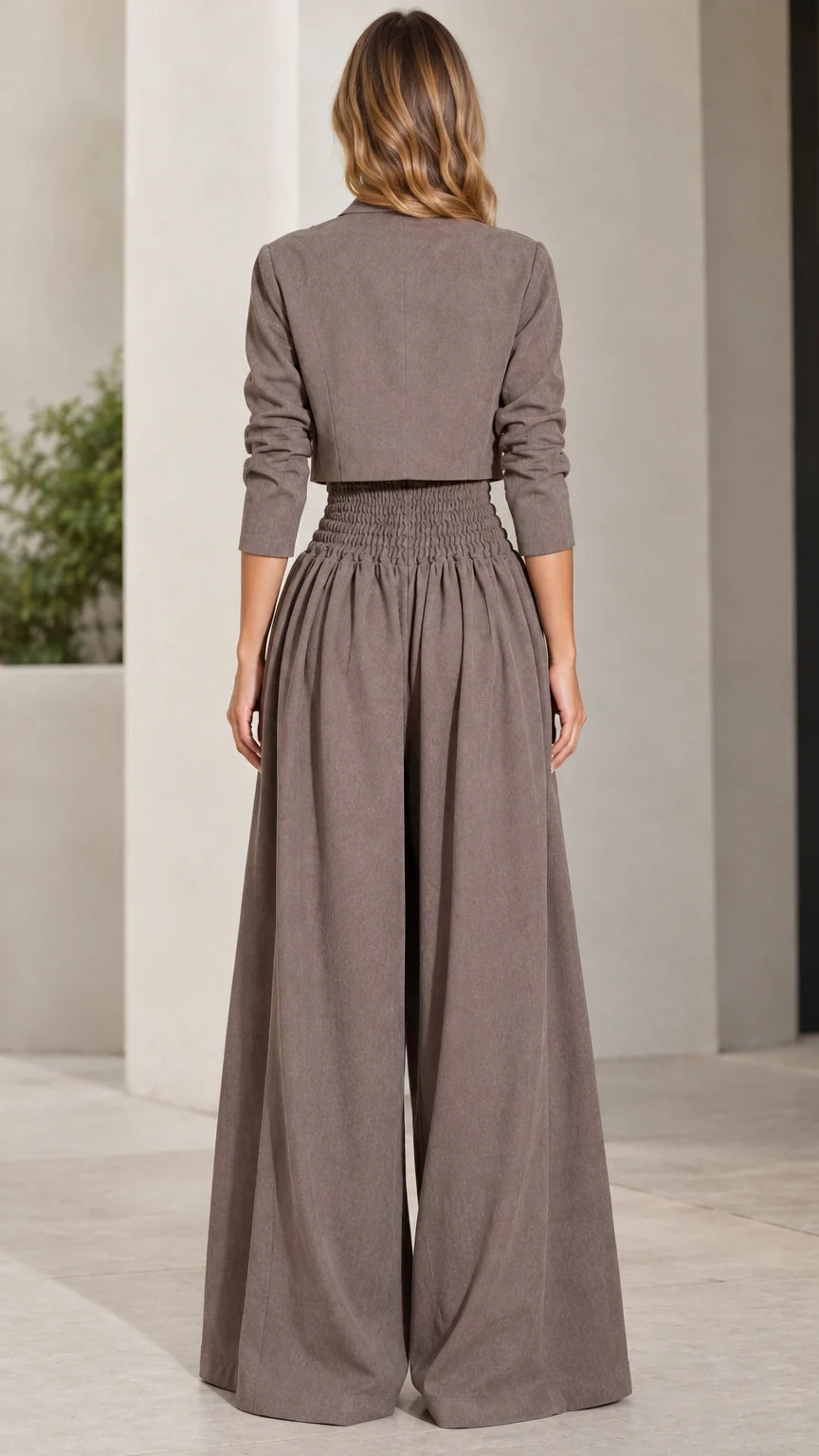 Back view of taupe cropped jacket and flowy wide-leg pants set
