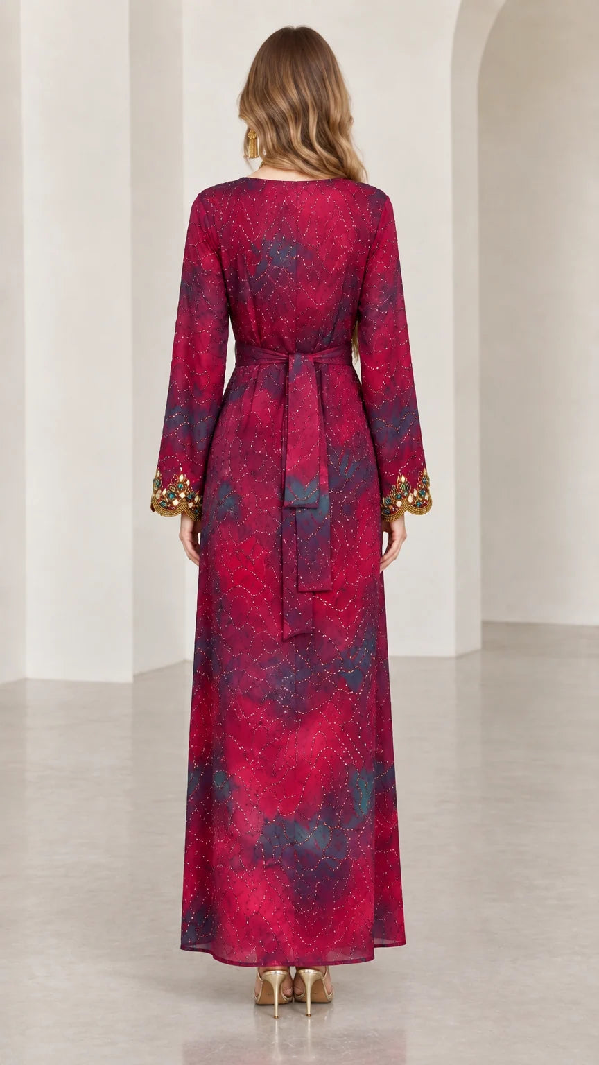 Back view of model wearing Burgundy tie-dye maxi dress with waist tie sash