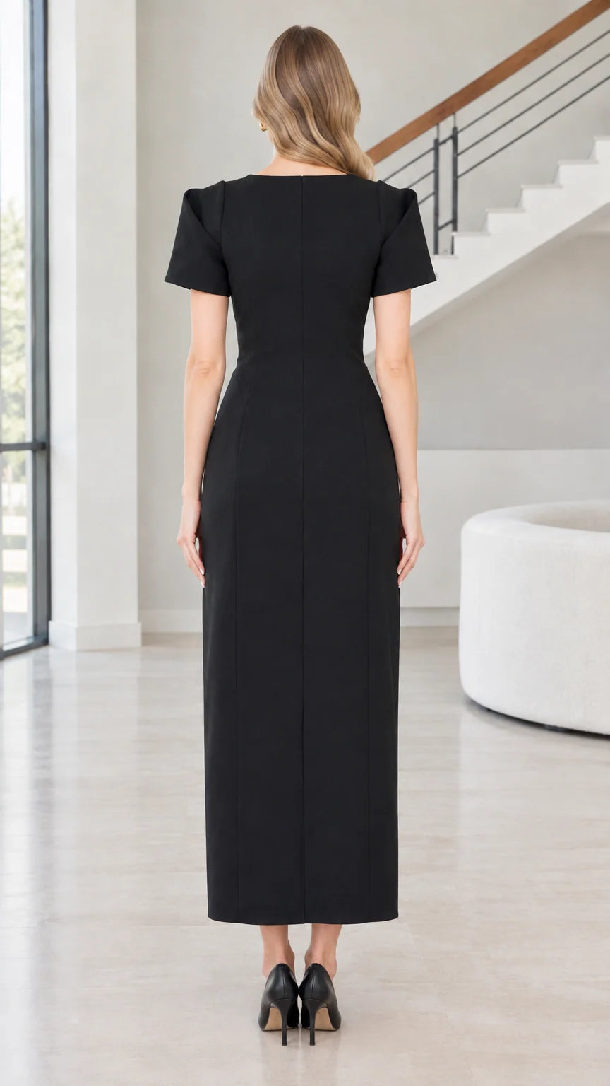 Back view of woman wearing Black maxi dress with invisible zipper closure