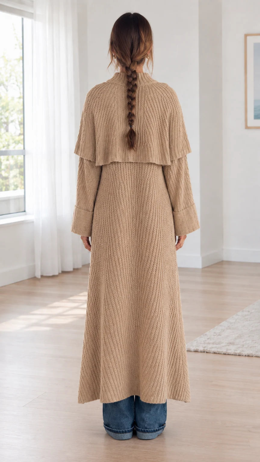Back view of camel ribbed knit long cardigan highlighting cape overlay detail