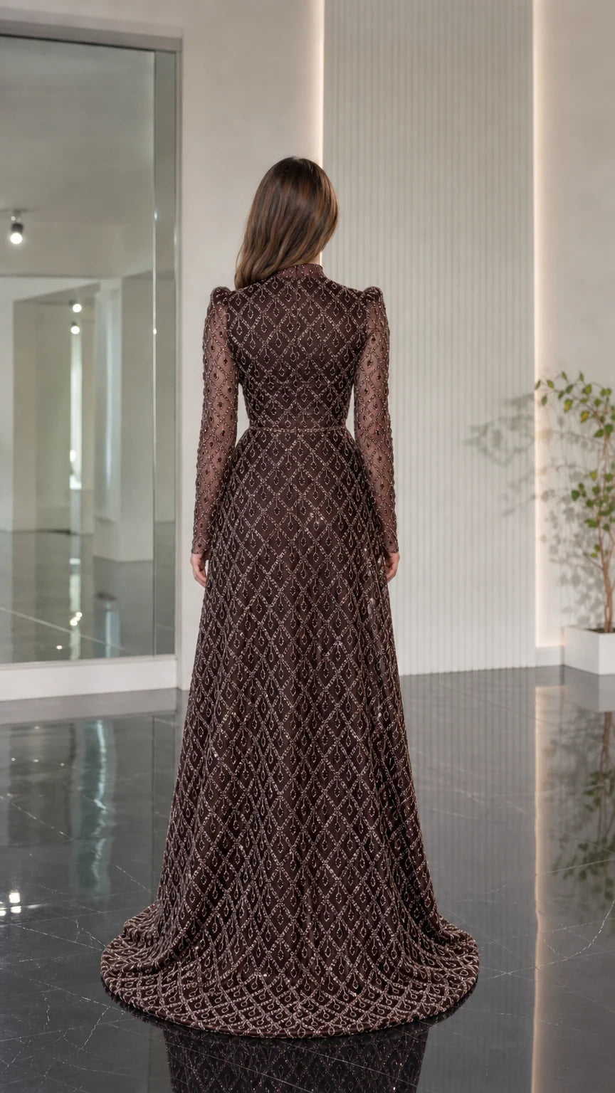 Back view of chocolate brown high neck beaded maxi dress with subtle train