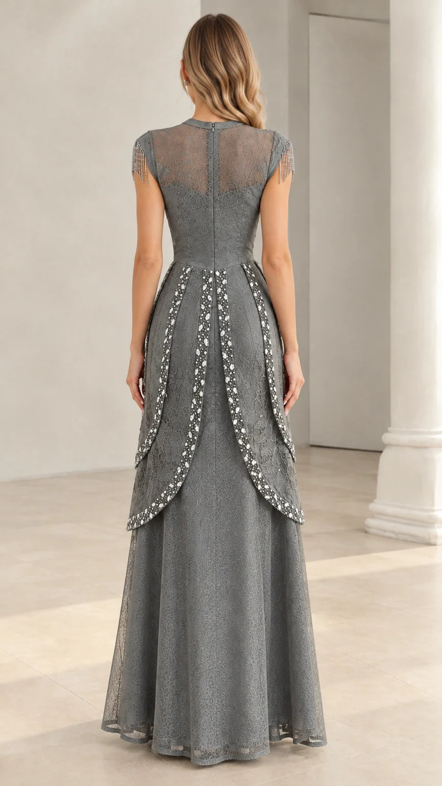 Back view of slate grey evening dress showing sheer lace back and zip closure