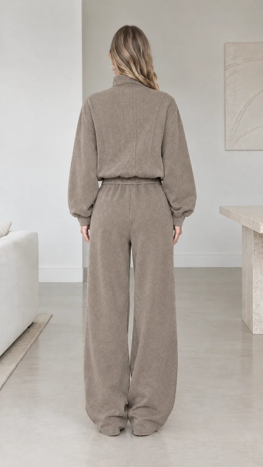 Back view of woman wearing taupe relaxed fit matching loungewear set