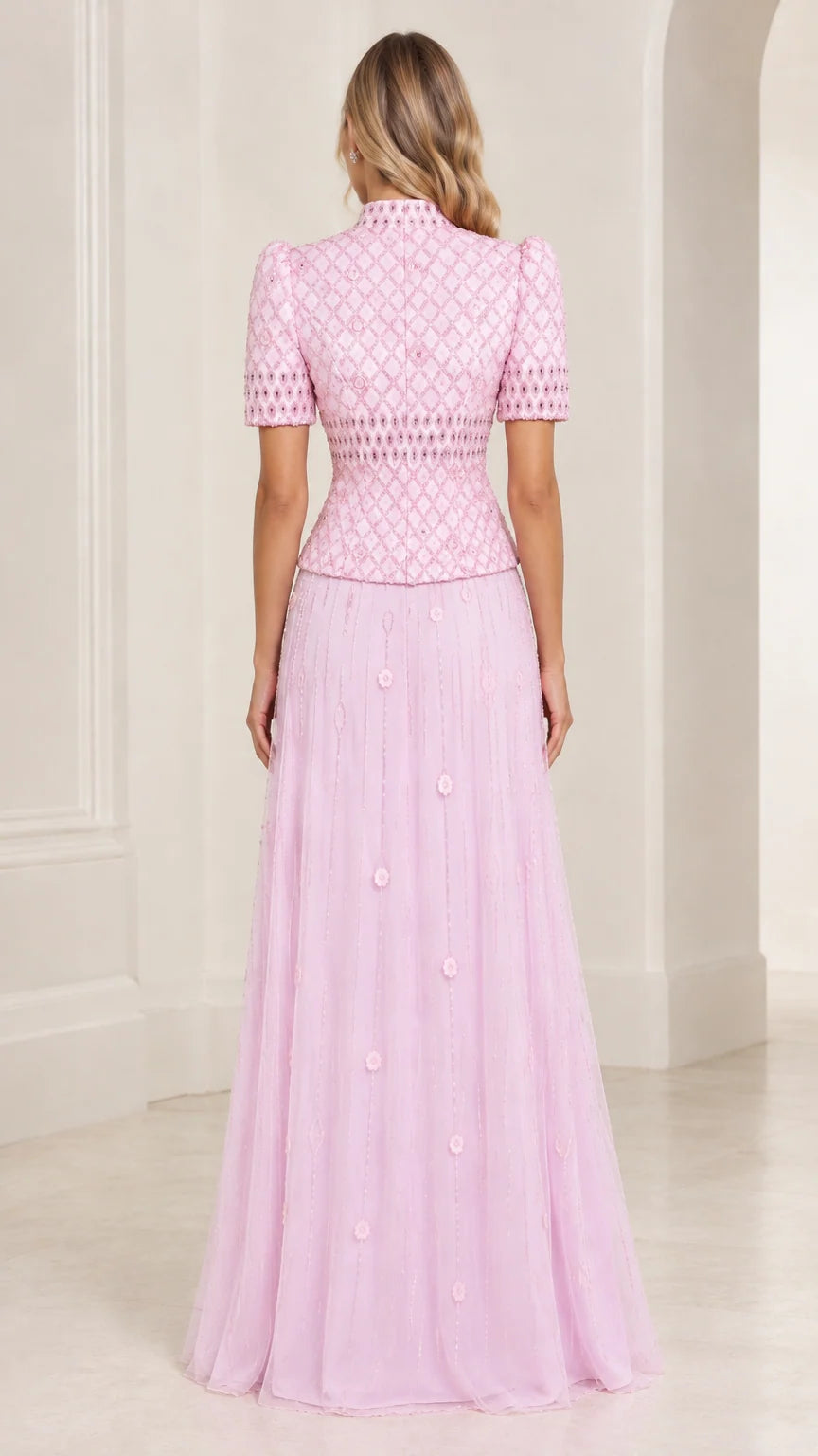 Back view of Light Pink high neck evening gown with structured bodice