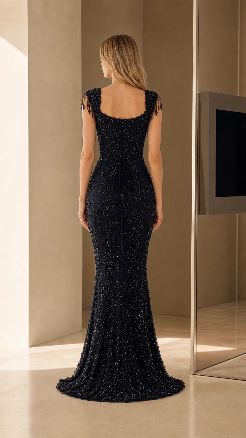 Back view of Navy beaded evening gown