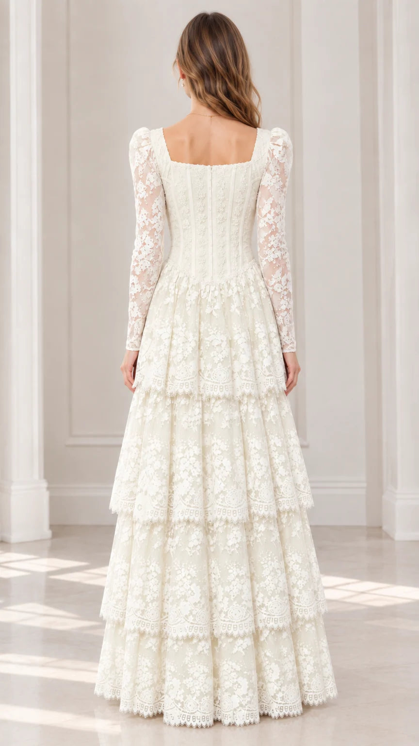 Back view of model wearing ivory long sleeve tiered lace maxi dress