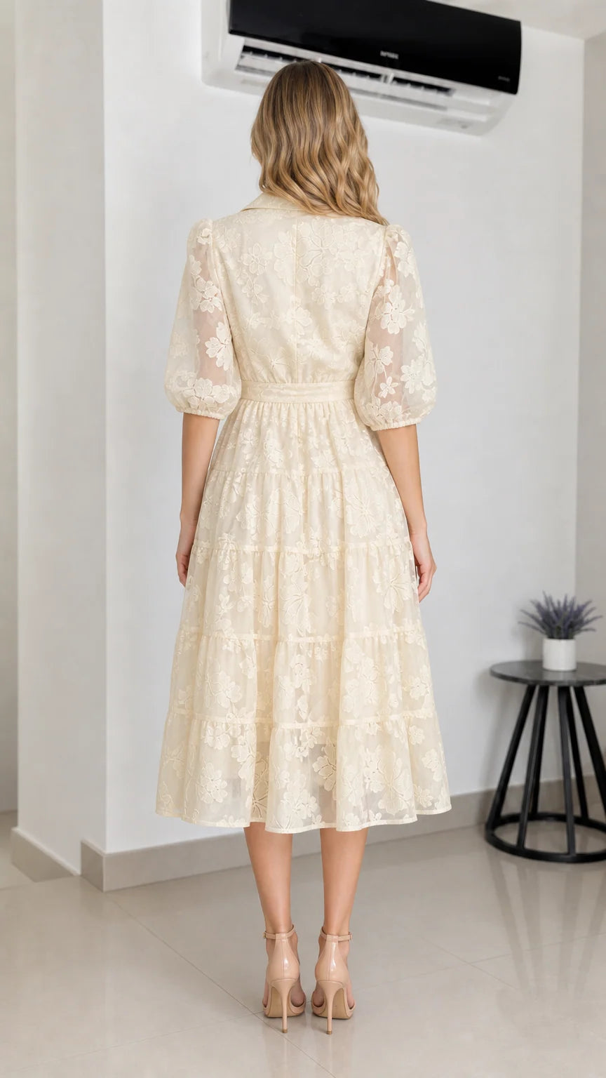 Back view of cream floral embroidered midi dress