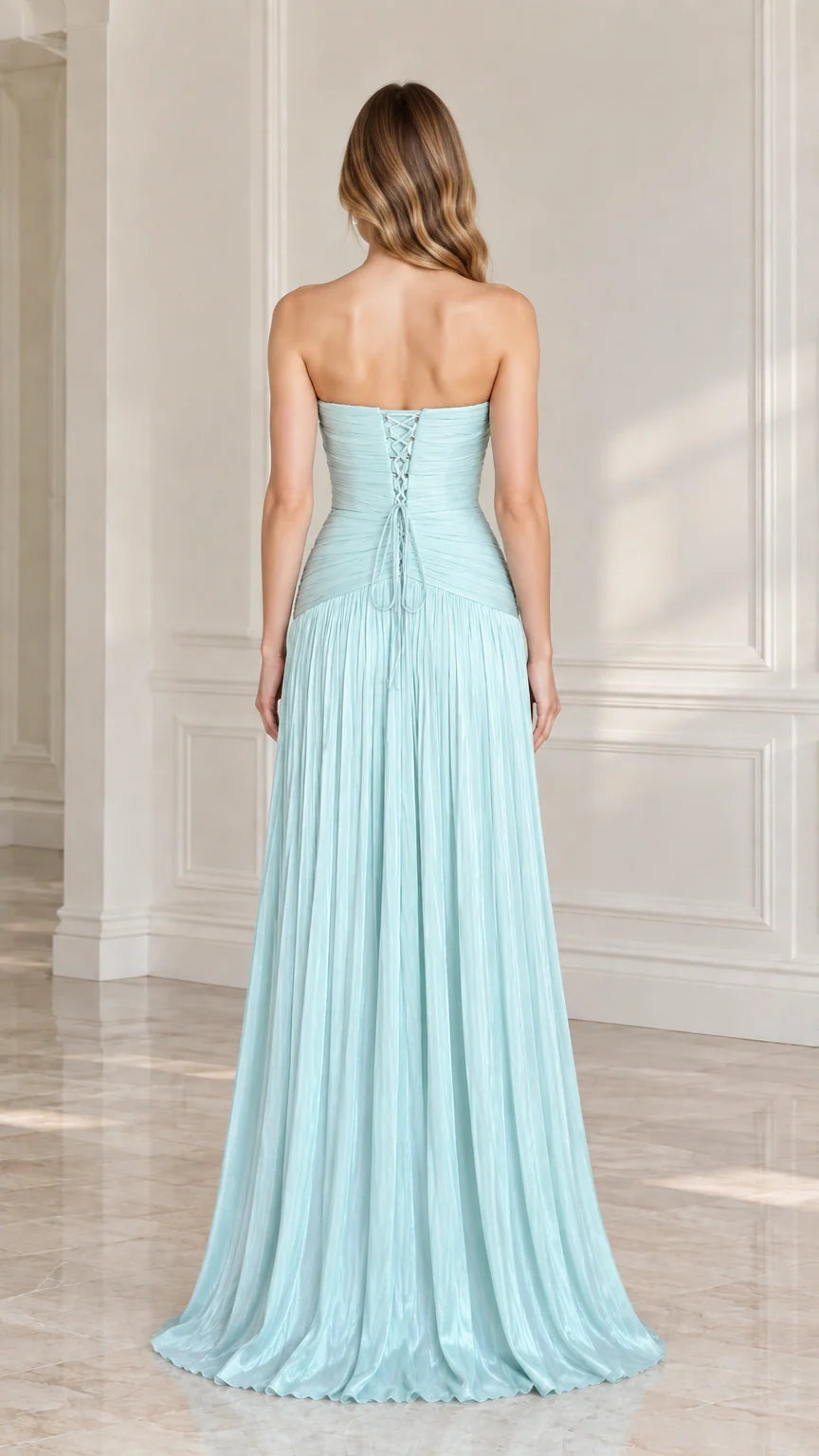 Back view of light blue pleated evening gown showing lace-up corset back