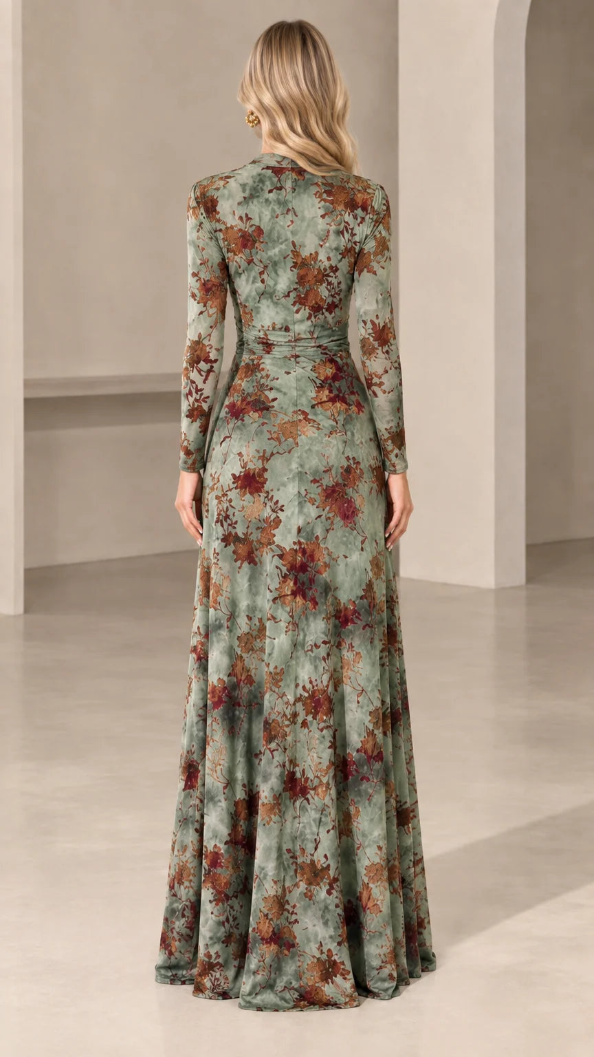 Back view of woman wearing sage green floral long sleeve maxi dress