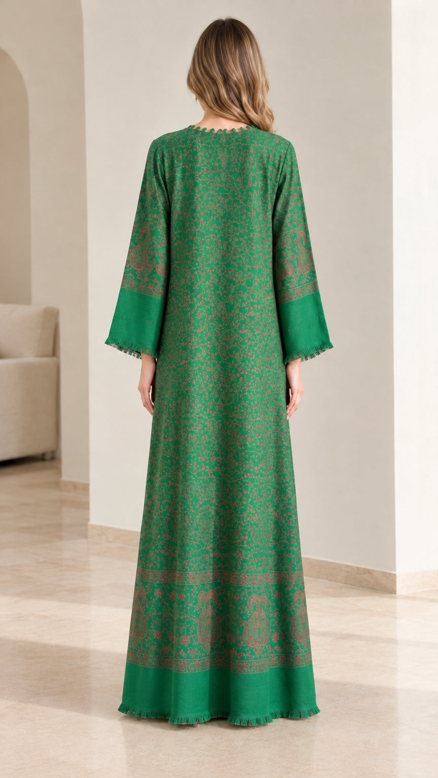 Back view of emerald green paisley maxi dress showing neck detailing and loose drape