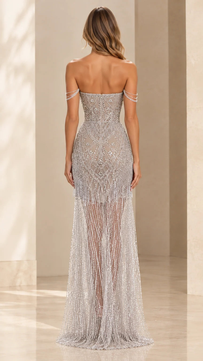 Silver sweetheart beaded evening dress back view showing sheer maxi overlay
